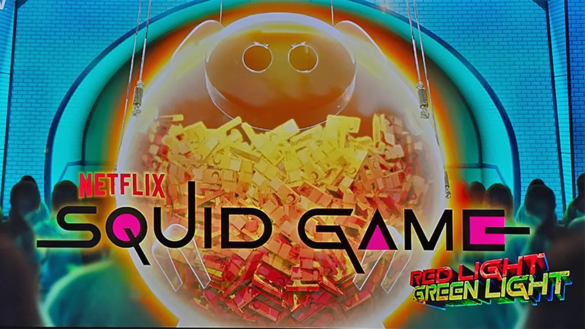 Tampilan visual slot Squid Game: Red Light, Green Light dengan elemen ikonik dari serialnya.